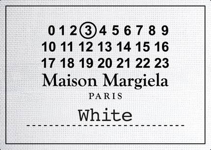 White Maison Margiela Paris label graphic with black text and numbered branding.