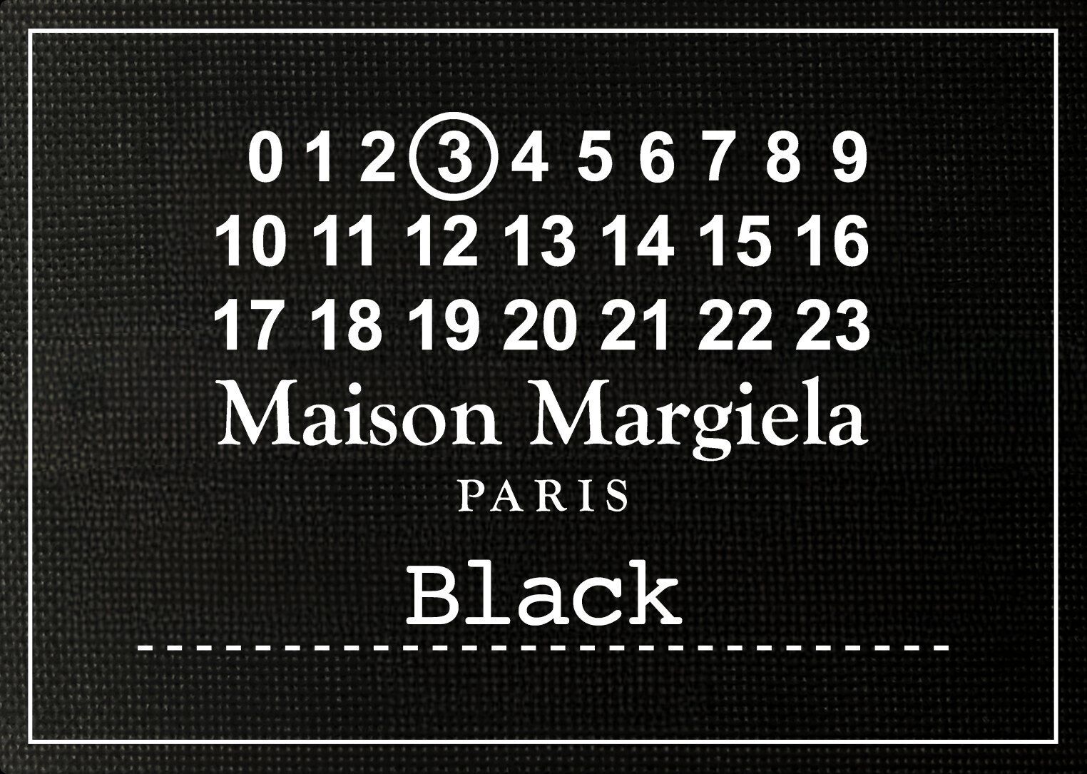 Black Maison Margiela Paris label graphic with white text and numbered branding.